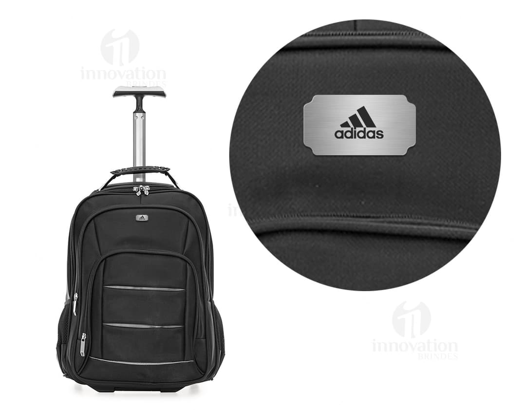 Mochila de carrinho de viagem em couro sintético resistente e moderno, ideal para sua próxima aventura. Prática e espaçosa, sua alça retrátil facilita o transporte. Garanta já a sua!