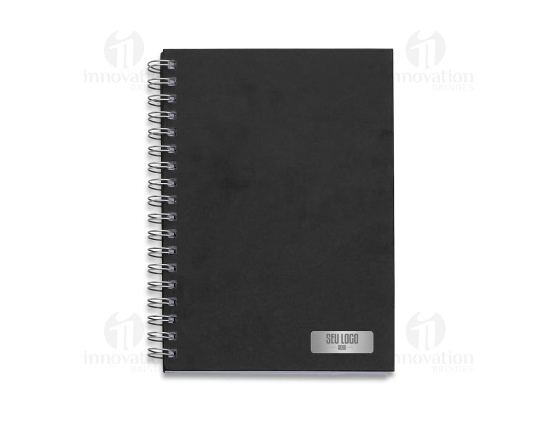 Caderno em couro sintético com espiral, ideal para suas anotações e organização diária. Perfeito para uso educacional e profissional. Armazene suas informações de forma prática e elegante.