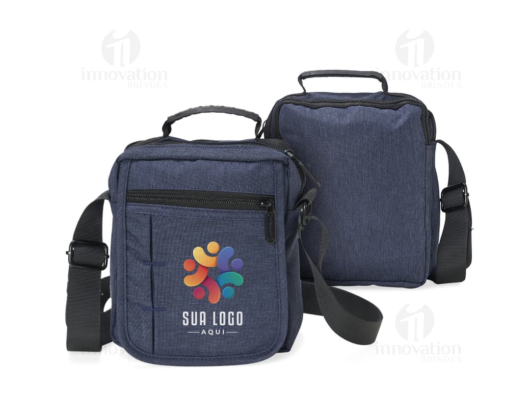 Bolsa de ombro de couro preto com alça, zíper e diversos compartimentos. Ideal para viagens de negócios, viagens a lazer ou uso diário. Estilo moderno e elegante, perfeito para carregar objetos pessoais, dinheiro, câmera e outros acessórios.