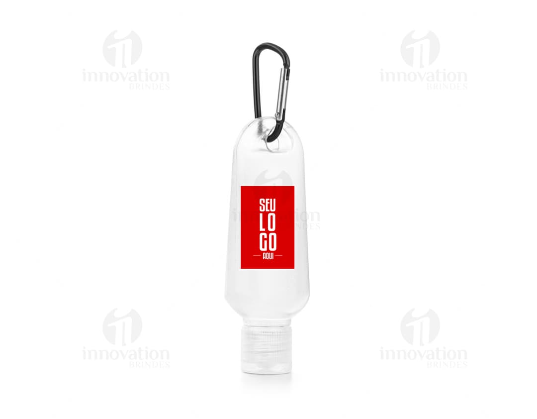 Frasco 50 ml transparente com tampa amarela, contendo líquido transparente. O frasco está vazio e limpo, faz parte de um conjunto de objetos de higiene e cuidados pessoais. É um recipiente moderno, com design clean e forma cilíndrica. A imagem mostra um produto para armazenar bebidas alcoólicas, como vodka ou vinho.