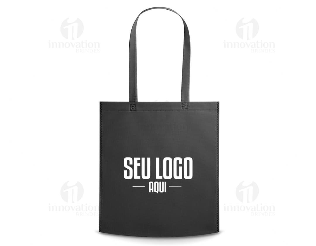 SACOLA 370 x 410 mm amarela e marrom com design moderno e detalhes em metal. Embalagem de papel brilhante com fecho de cadeado, tag de preço e alça resistente. Ideal para compras em lojas de moda e presentes.