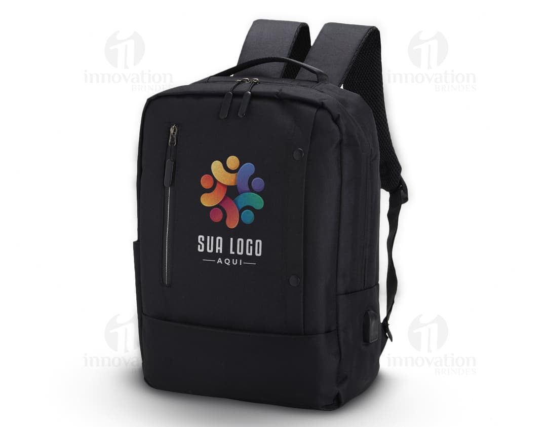 Mochila preta de nylon com 22 litros de capacidade, possui entrada USB e 4 compartimentos. Ideal para uso em viagens de negócios ou no dia a dia para transportar objetos e equipamentos de forma organizada.