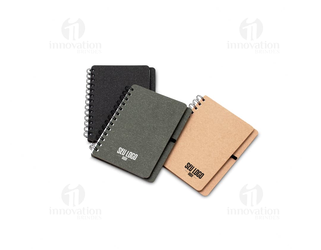 Caderneta Kraft B6 com Porta Caneta - Ideal para anotações diárias, esta caderneta kraft possui um prático porta caneta acoplado. Perfeita para organização e praticidade no dia a dia. Adquira a sua agora!