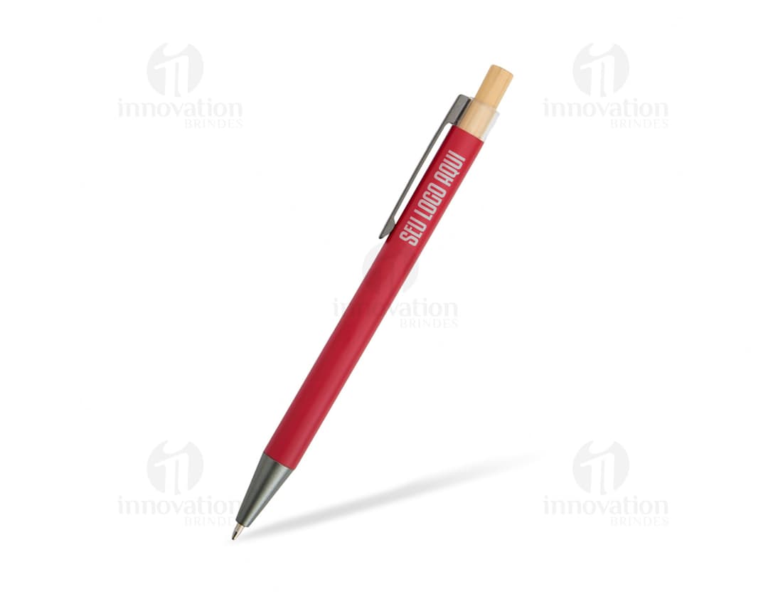 Caneta metal prateada com detalhes em dourado e tampa removível.