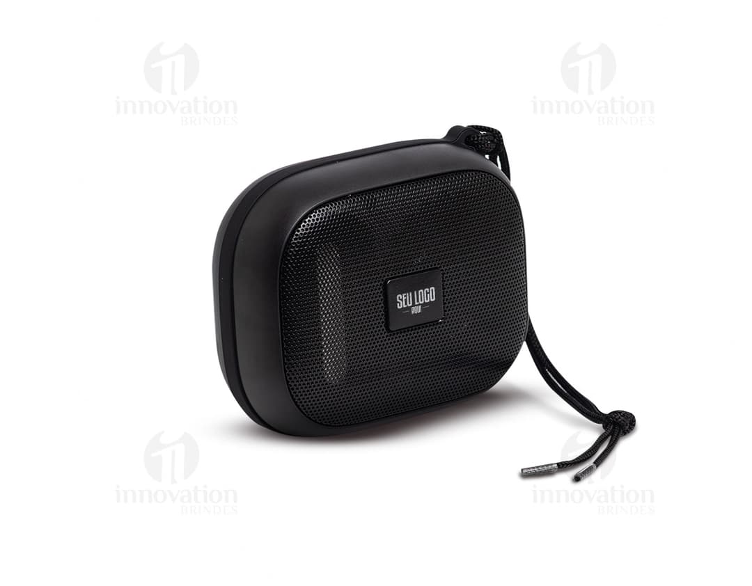 Caixa de som Bluetooth preta com design moderno e elegante, possui botões de controle na parte superior e conexão sem fio para dispositivos móveis.