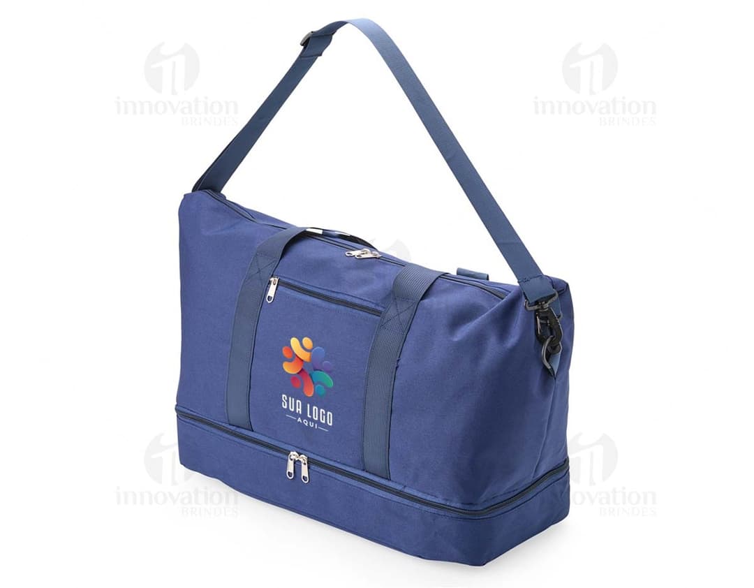 Bolsa Oxford 19 litros em cor azul, com alças de ombro e bolsos externos.
