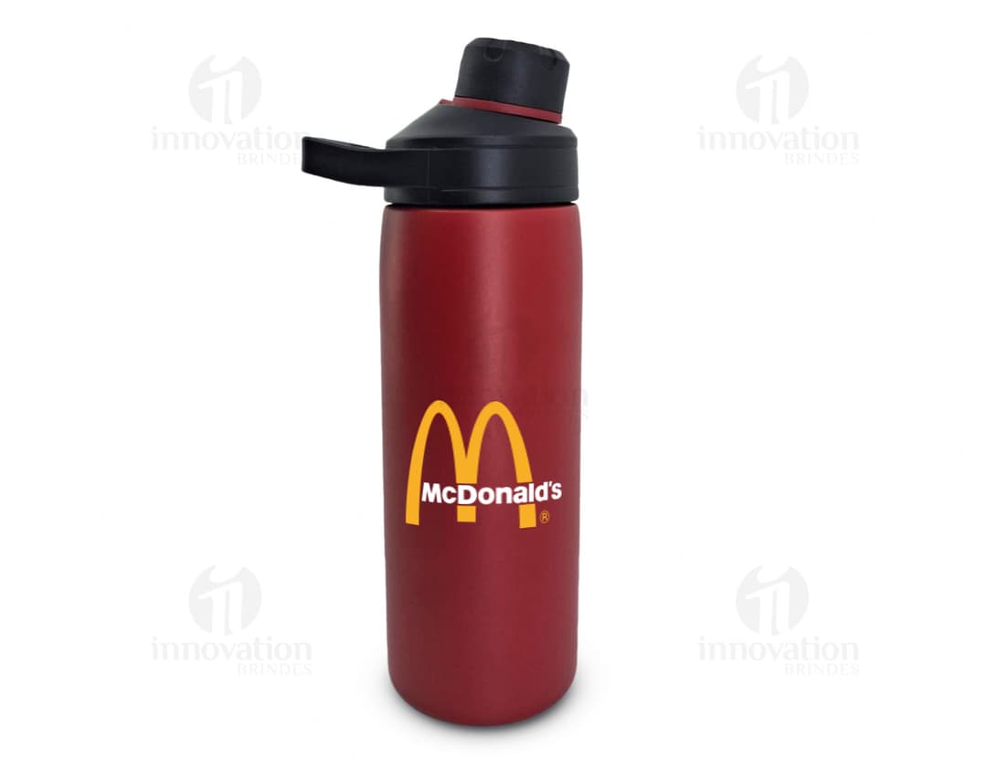 Garrafa térmica de 600ml em metal, com tampa e design elegante. A garrafa possui uma etiqueta e está vazia, pronta para armazenar líquidos quentes ou frios. A superfície é brilhante e reflexiva, garantindo a conservação da temperatura do líquido por mais tempo. O produto é ideal para manter-se hidratado durante viagens, atividades ao ar livre ou no dia a dia.