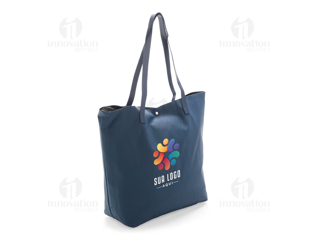 SACOLA EM COURO SINTÉTICO preta e marrom, modelo elegante e moderno com alça, zíper e detalhes em metal. Ideal para compras e uso pessoal, vazia e pronta para ser carregada.